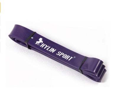 Purple latex resistance band for fitness and strength training.