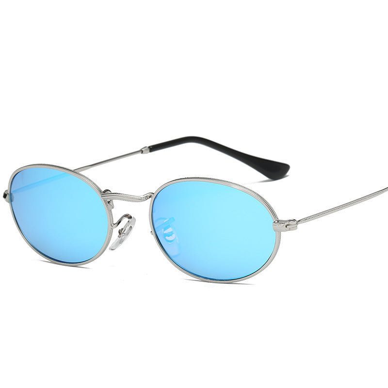 Luxury fashion women's sunglasses with oval metal frames and blue lenses, offering UV400 protection.