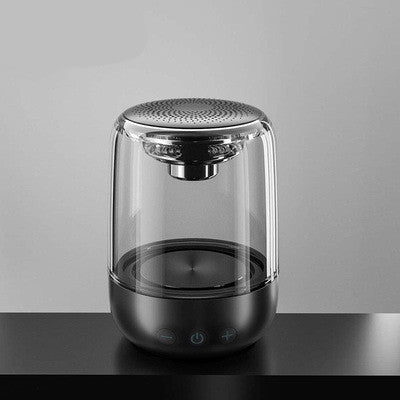 Portable Bluetooth speaker with clear sound, powerful bass, LED light, and wireless transmission.