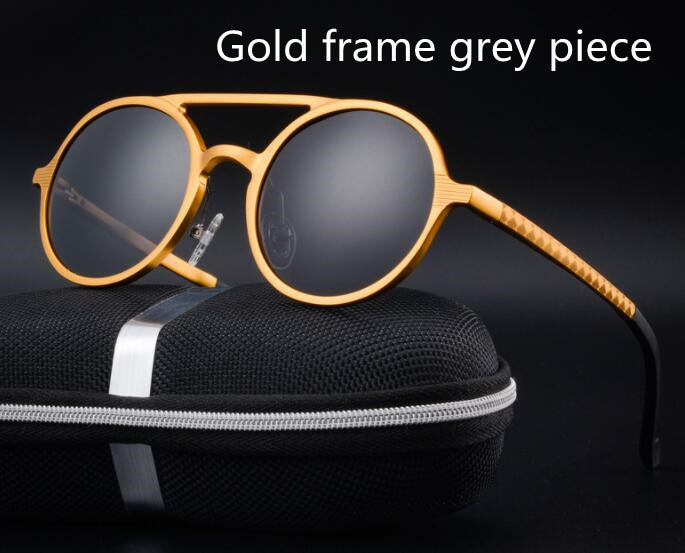 Gold frame retro aluminum magnesium sunglasses with polarized lenses on black case.