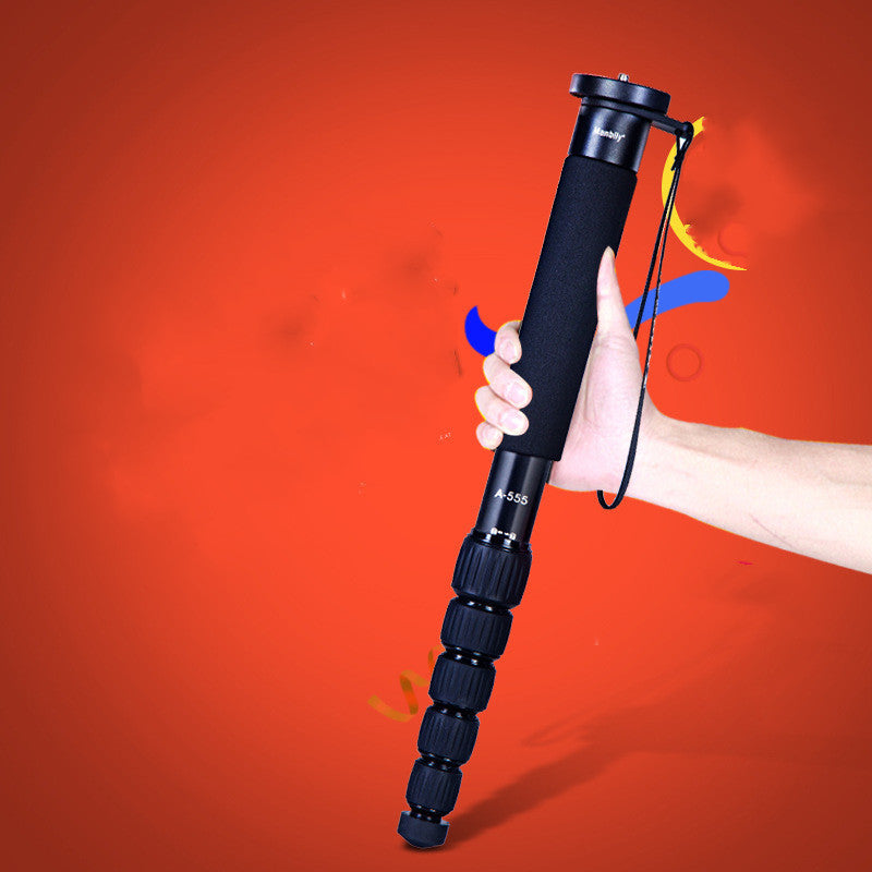 SLR Camera Aluminum Alloy Monopod, Model A-555, held in hand with vibrant background.