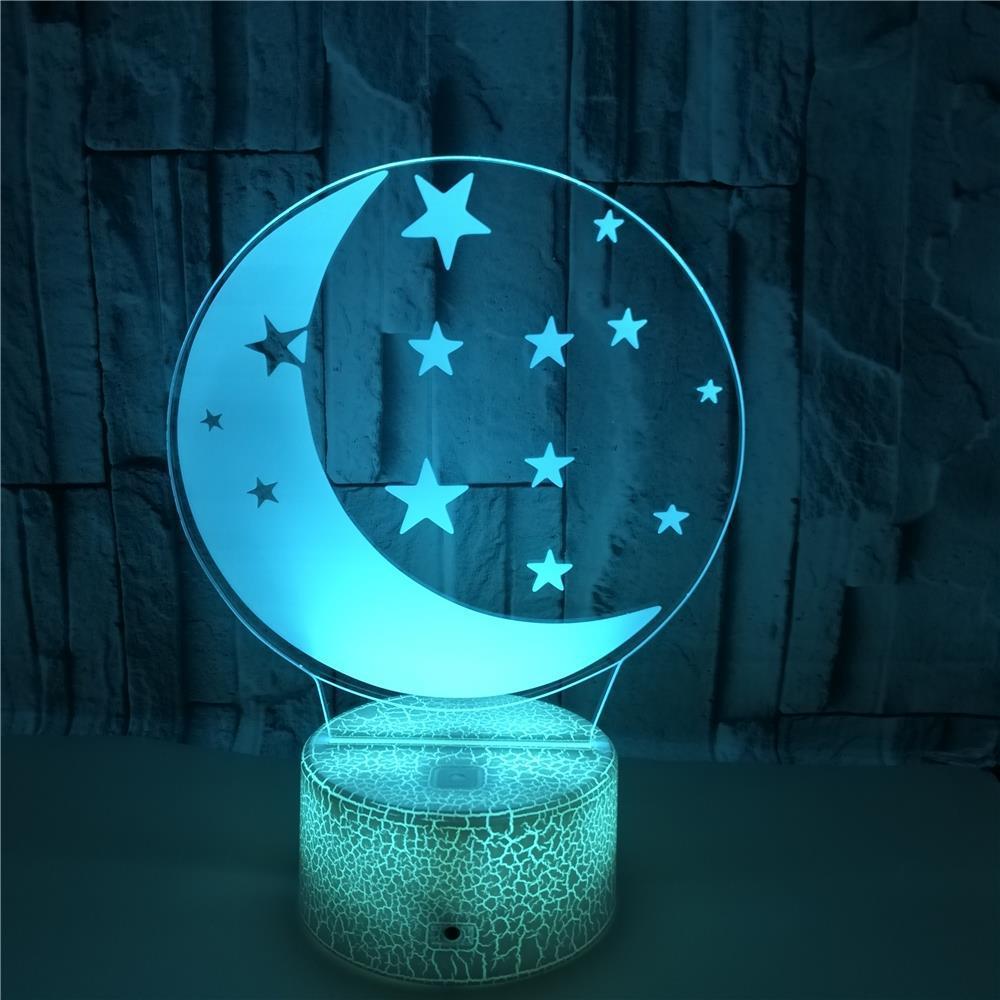 Moon 3D table lamp with crescent and stars design, USB powered, on a decorative base.