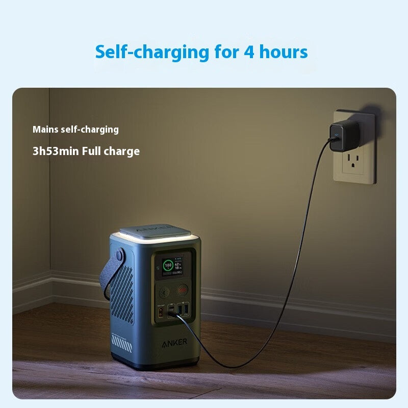 Dynamic Power 60000mAh power bank self-charging for 4 hours, plugged into wall outlet.