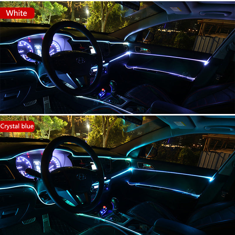 Car interior illuminated with white and crystal blue LED strip lights.