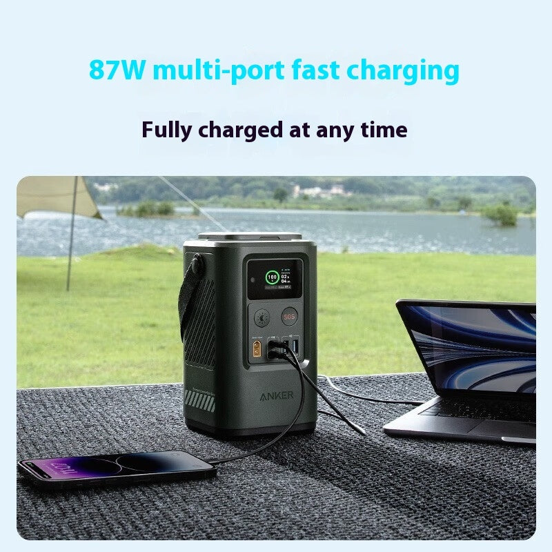 Outdoor use of the Dynamic Power 60000mAh power bank with multiple devices connected.
