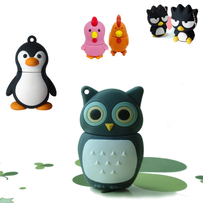 Cartoon penguin USB drive in black and white with orange beak and feet, USB 3.0 interface, available in multiple storage capacities.