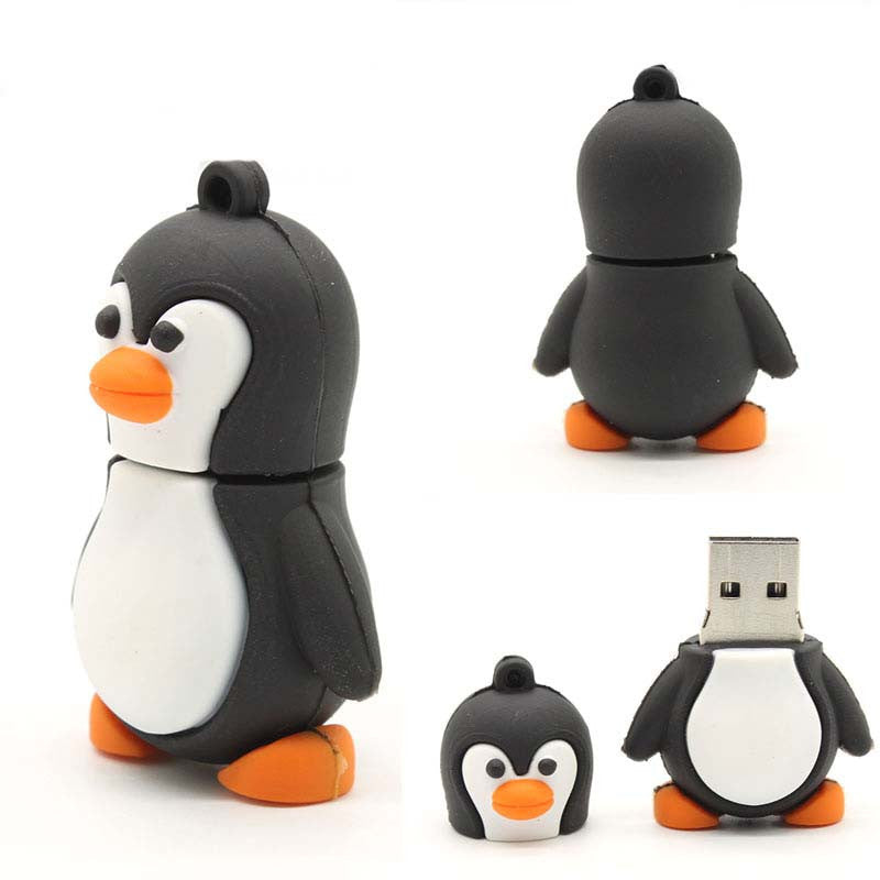 Cartoon Penguin USB Drive in black and white with orange feet and beak, USB 3.0 interface, available in multiple storage capacities.